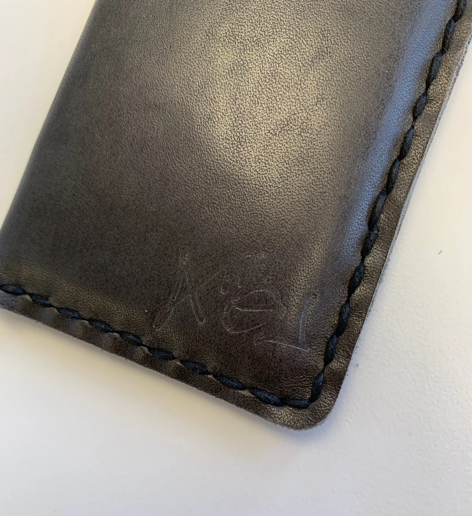 Stamped leather wallet detail